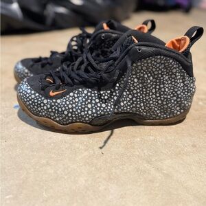 Nike Black and Gray Athletic Shoes with Orange Highlights